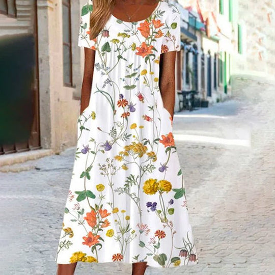 Florella | Dames zomerjurk met korte mouw en bloemenprint - ZovaFashion - Midi Jurken