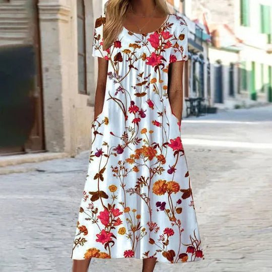 Florella | Dames zomerjurk met korte mouw en bloemenprint - ZovaFashion - Midi Jurken