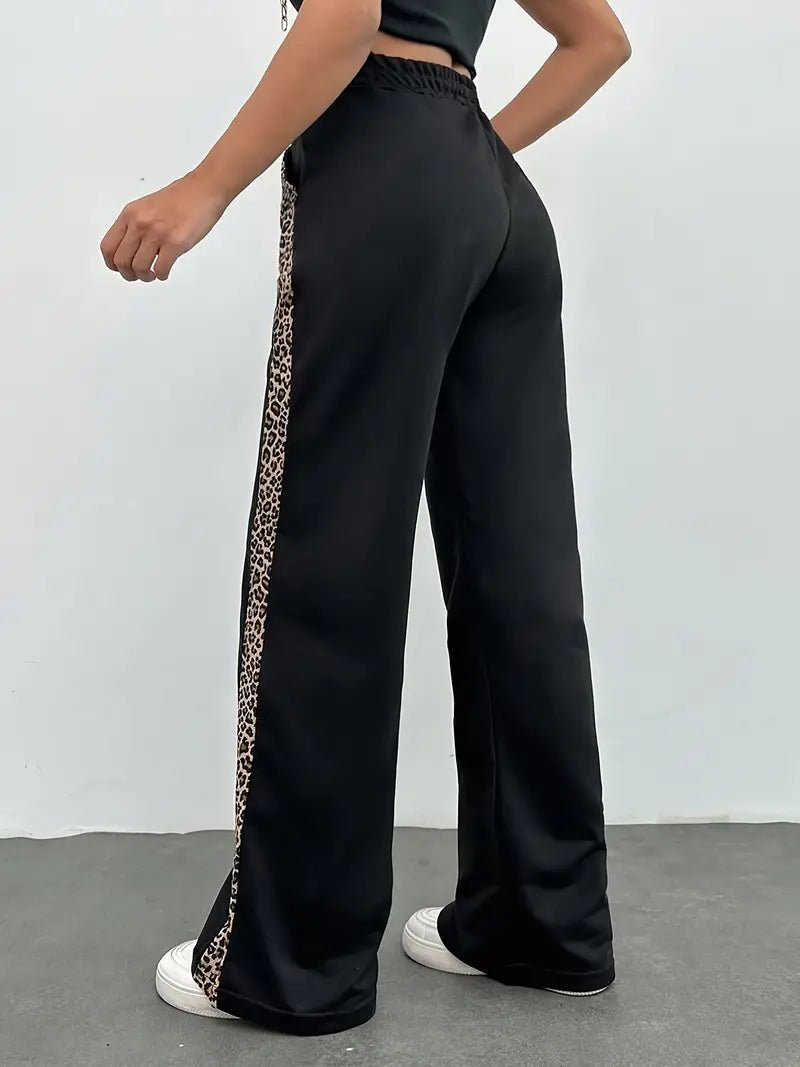Zwarte Luipaardprint Joggingbroek Dames met Elegante Zijslit en Lichtgewicht Design - ZovaFashion - Joggingbroek dames