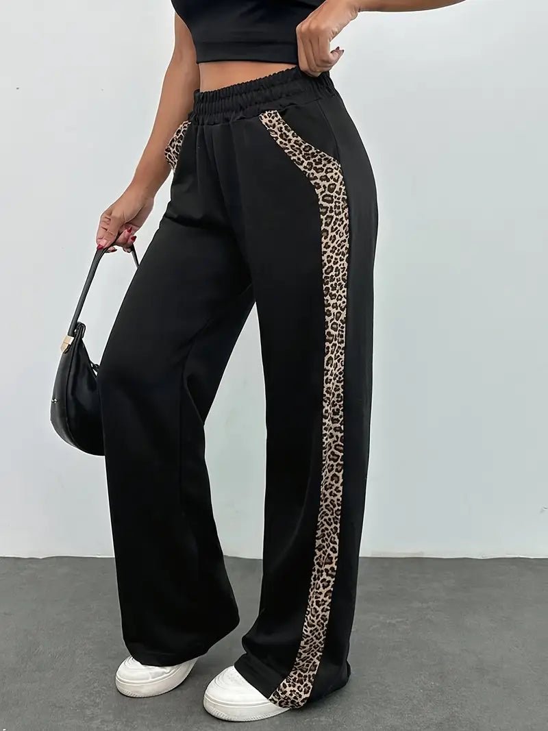 Zwarte Luipaardprint Joggingbroek Dames met Elegante Zijslit en Lichtgewicht Design - ZovaFashion - Joggingbroek dames