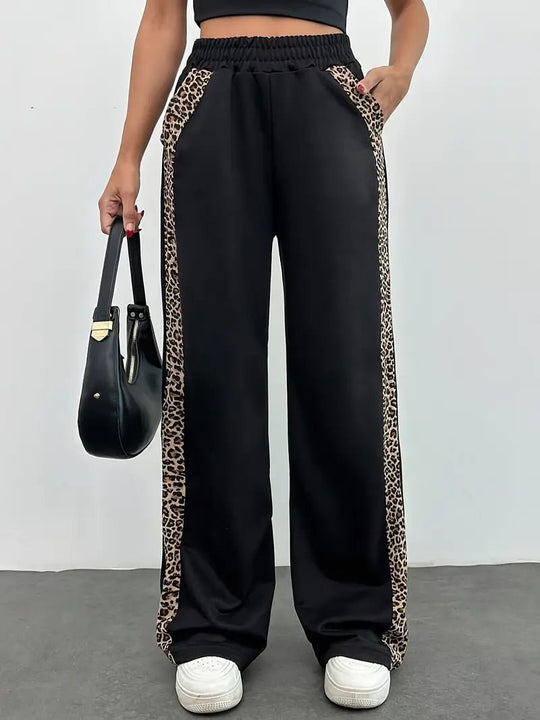 Zwarte Luipaardprint Joggingbroek Dames met Elegante Zijslit en Lichtgewicht Design - ZovaFashion - Joggingbroek dames